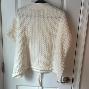 Cream Express sweater.